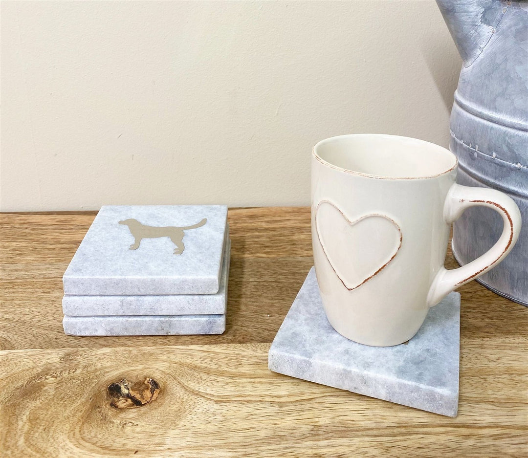 Four Square White Marble Coasters With Gold Dog Design